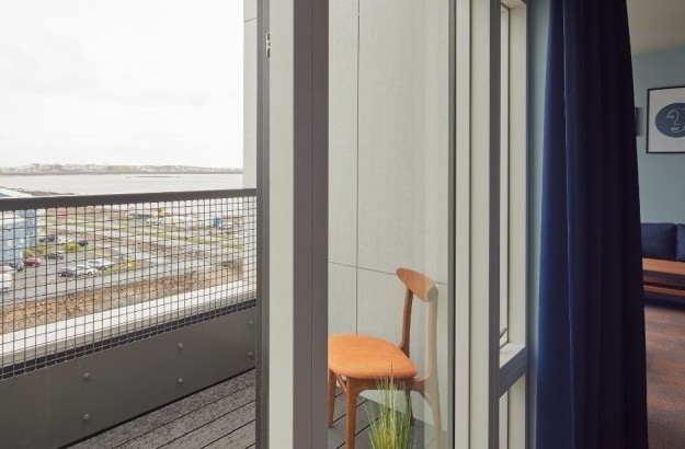 Private suite balcony at Grandi by Center Hotels in Reykjavik with nice view, accessed from the living area.