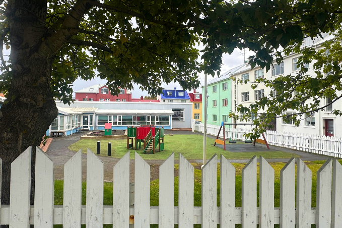 Children’s playground surrounded by colorful houses in central Reykjavík, Iceland