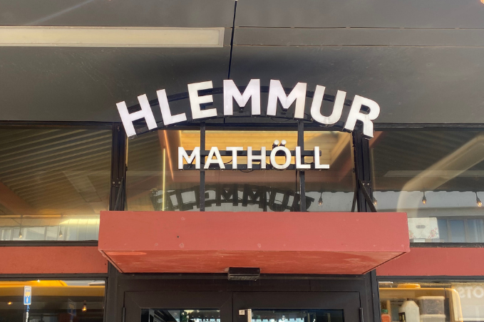 Entrance sign for Hlemmur Mathöll food hall in central Reykjavík.