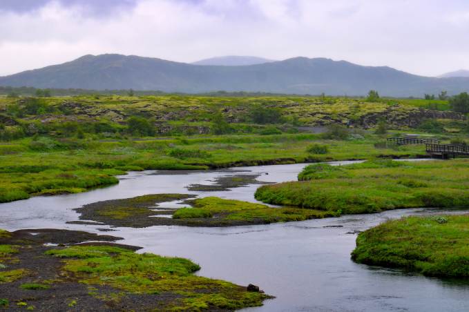 River flowing through Þingvellir National Park landscape in Iceland