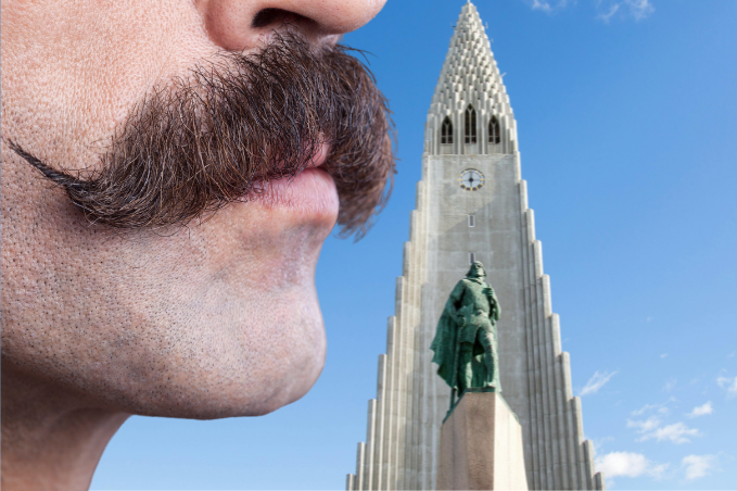 Close-up of a man’s mustache beside Hallgrímskirkja church in Reykjavík