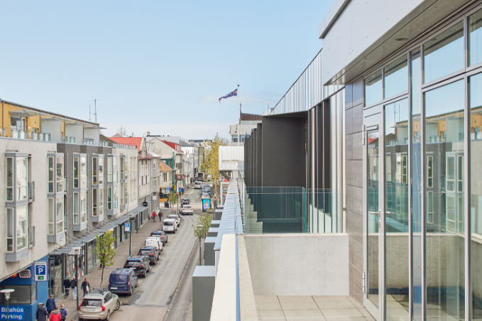 View over the Laugavegur street seen from above with Center Hotels Laugavegur on the right side.