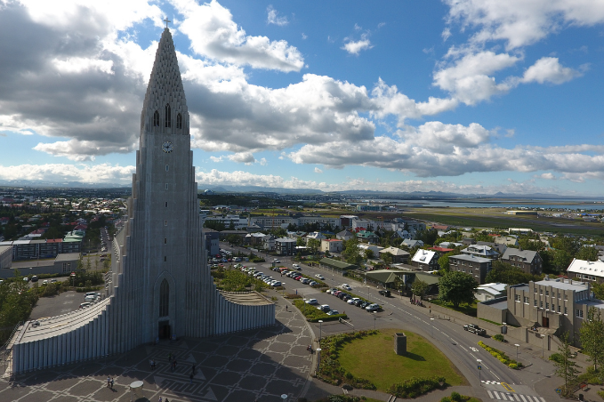 Overview over Hallgrímskirkja in Reykjavík with parking available visible