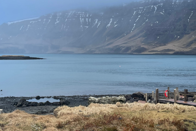 Ocean and mountain views at Hvammsvik Hot Springs in Iceland