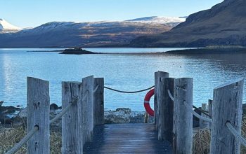 Ocean and mountain views at Hvammsvik Hot Springs in Iceland
