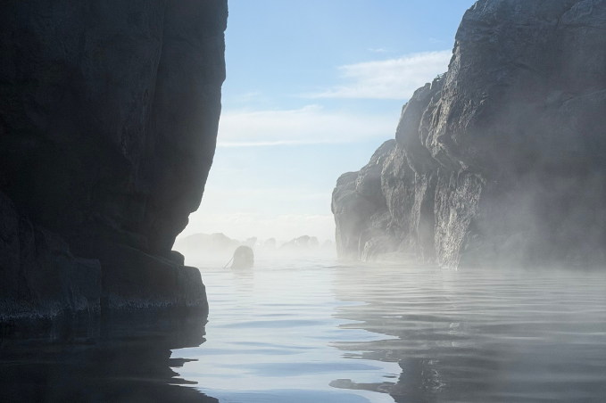 Sky Lagoon geothermal spa surrounded by dramatic Icelandic coastal scenery