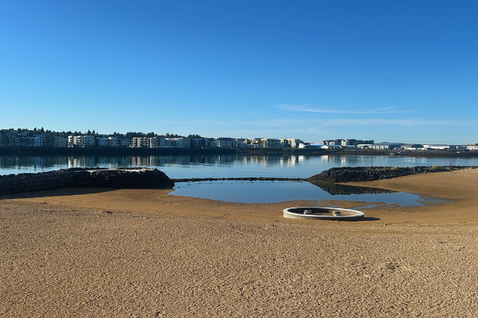 Sandy beach and geothermal bathing area at Nauthólsvík in Reykjavík, Iceland