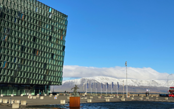 Harpa Concert Hall in Reykjavík with Mount Esja in the background