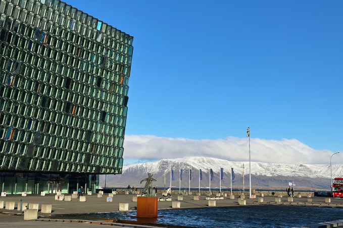 Harpa Concert Hall in Reykjavík with Mount Esja in the background